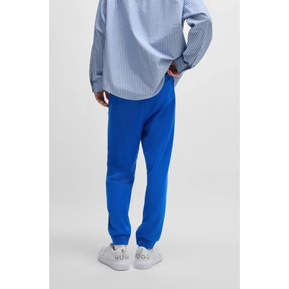Baumwoll-Frottee-Jogginghose mit Happy-HUGO-Logo-Patch