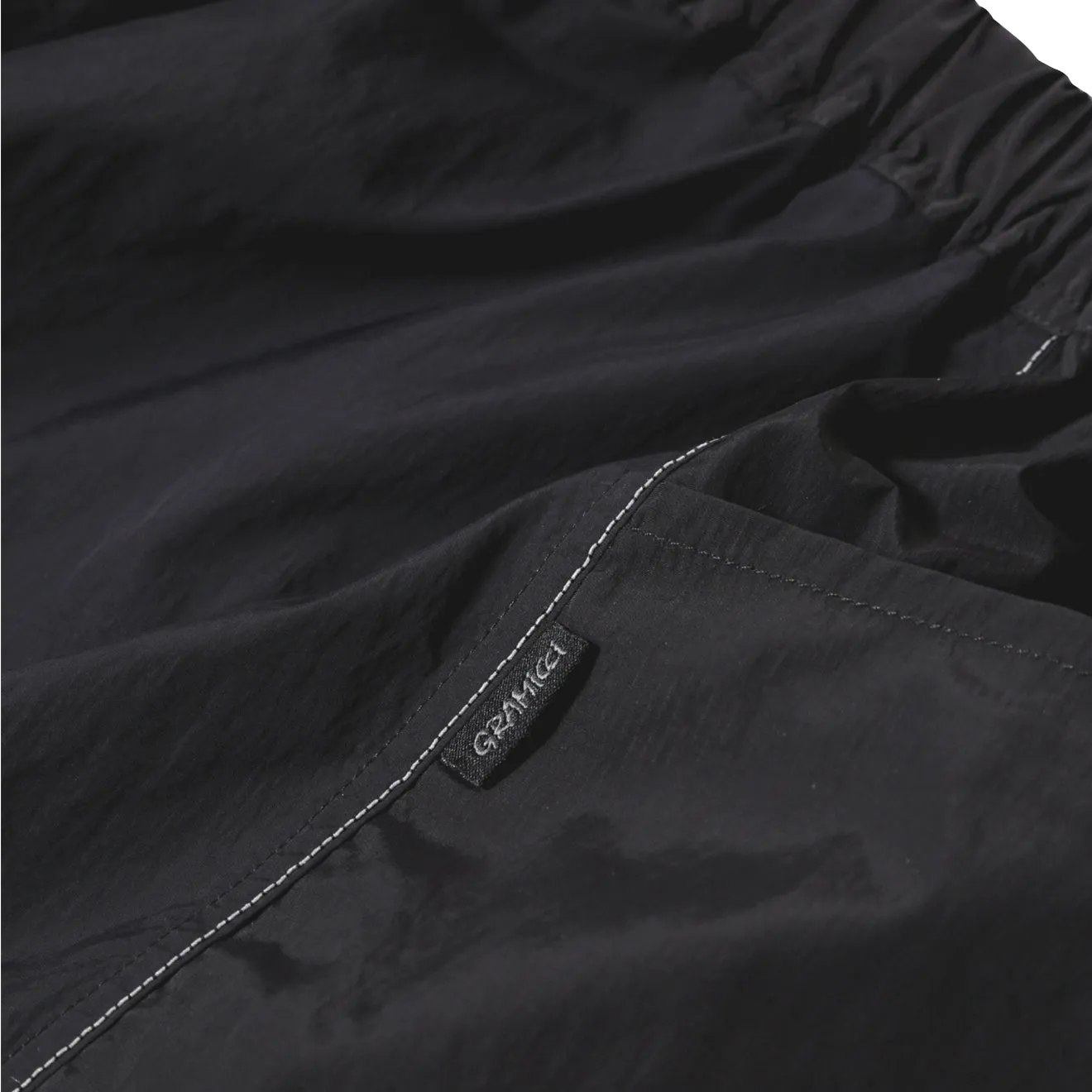 Gramicci x And Wander Patchwork Wind Short Schwarz