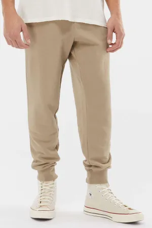 Independent Trading Company Herren Pigmentgefärbte Fleece-Jogginghosen mit Taschen - Sandsteinbraun