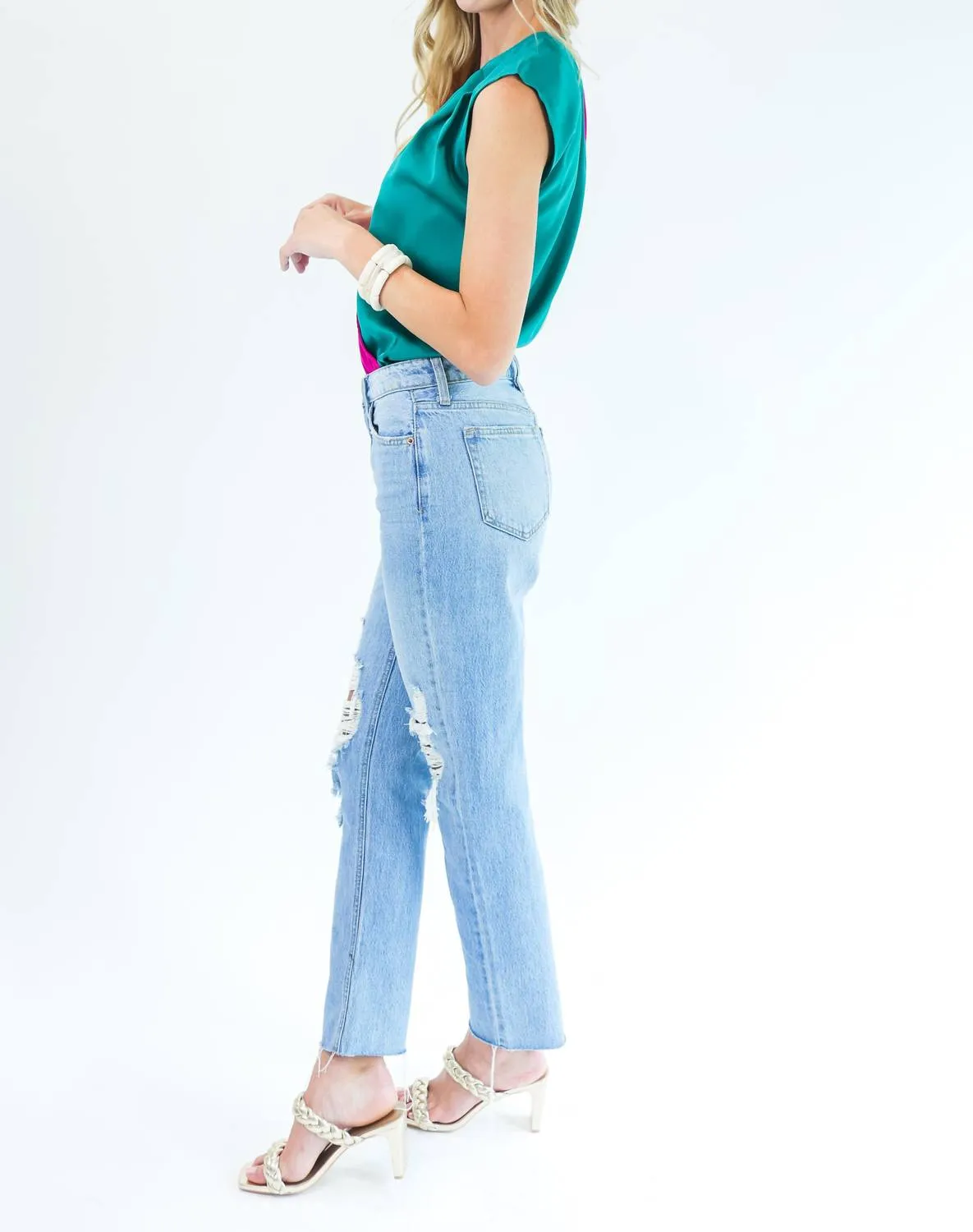Erfolgreicher Beauty-Bodysuit in Petrol