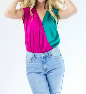 Erfolgreicher Beauty-Bodysuit in Petrol